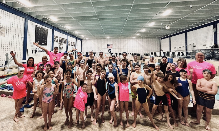 Making waves! The students of the Westport Swim Club pose before a ‘candy’ meet. Each swimmer gets a piece of candy after each race, regardless of their placement or time. 